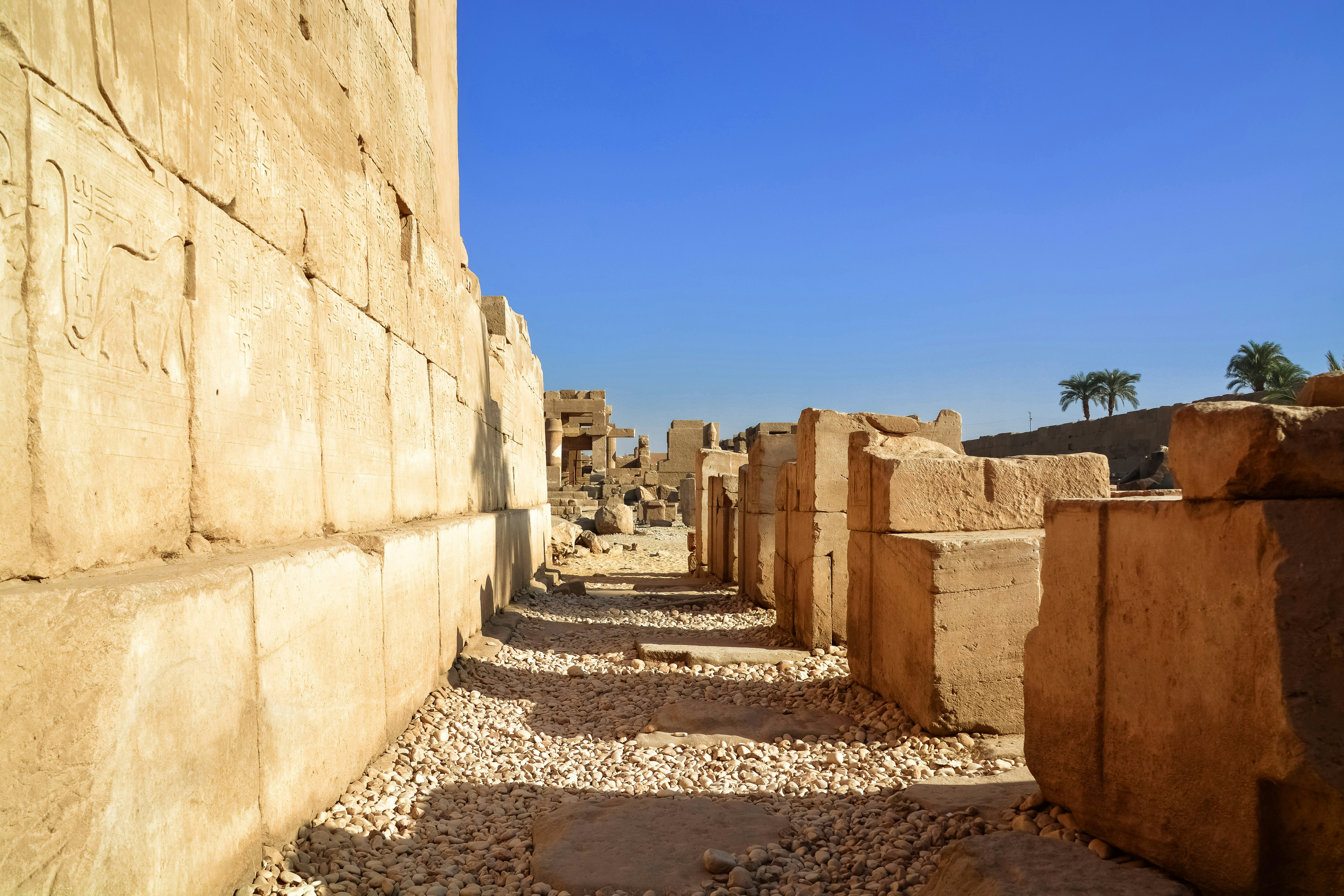 brown concrete wall under blue sky during daytime